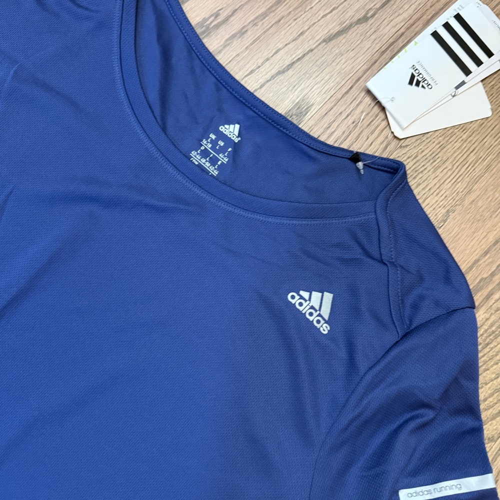 Adidas Women's run Short Sleeve Tee in purple. NWT - Picture 2 of 2